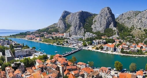 See the rugged cliffs over Omis on your trip to Croatia