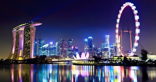 Singapore city skyline at night - always a highlight when on a Singapore vacation.