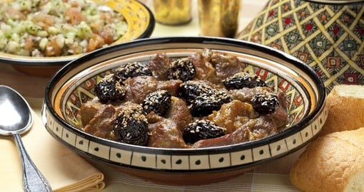 Moroccan dish with meat plums and sesame seeds
