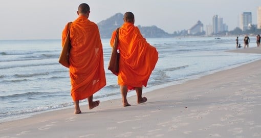Two monks take a walk on the beach