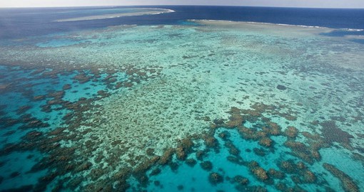 Take a boat ride or snorkel through the Great Barrier Reef in Australia during your next trip to Australia.