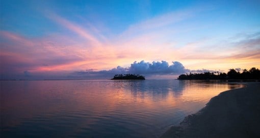 Enjoy Sunset on Muri Beachi on your visit to the Cook Islands