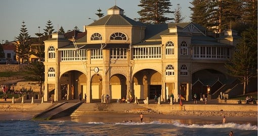 Swimmers relaxing in front of the pavilion at Cottesloe Beach