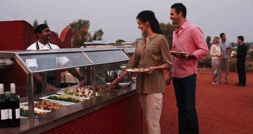 Taste traditional dishes prepared for your group by trained cooks on your Australia Vacation