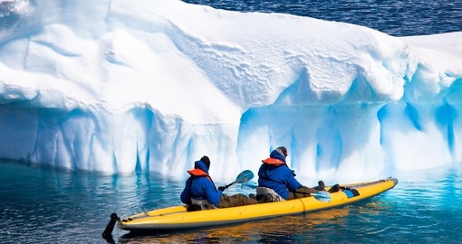 Two men among icebergs