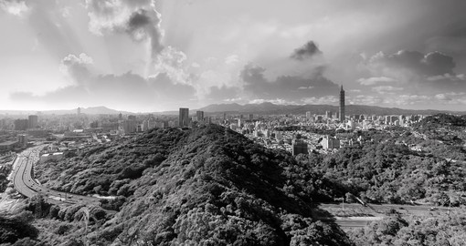 The dramatic Taipei skyline at sunset - a great photo opportunity to experience when booking one of our Taiwan vacations.