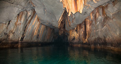 Explore one of the new 7 wonders of the world, Puerto Princesa Cave in the Philippines on your Philippines Vacation