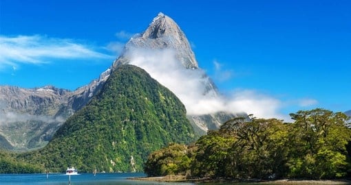 Explore a Small Waterfall at Milford Sound on your next New Zealand tours.