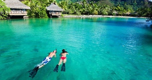 Young couple snorkeling
