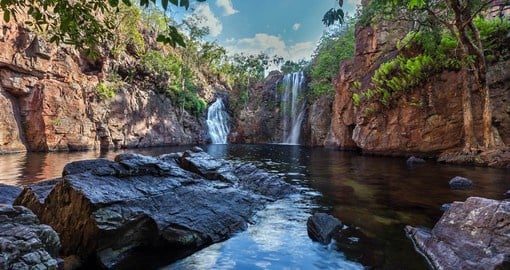 Add up to your memory by visiting stunning waterfalls and crystal clear pools at Litchfield National Park on your next vacations to Australia