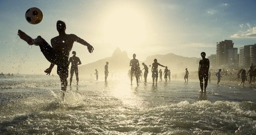Carioca Brazilians playing beach football