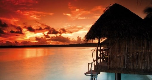 Gaze off into the sunset at the Aitutaki Lagoon Private Island Resort during your next Cook Island Trip.