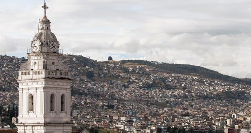Enjoy the view of Santo Domingo Church and Aerial View of Quito on your Ecuador Vacation