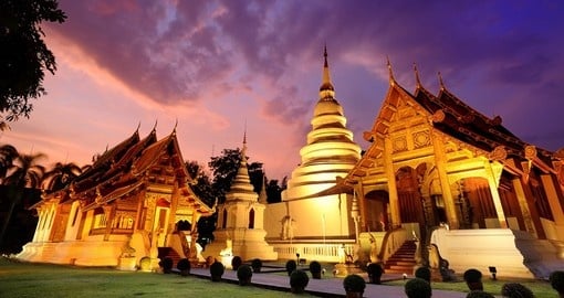 Walk along the ancient ruin pathways of the Phra Singh temple on one of your Thai Tours