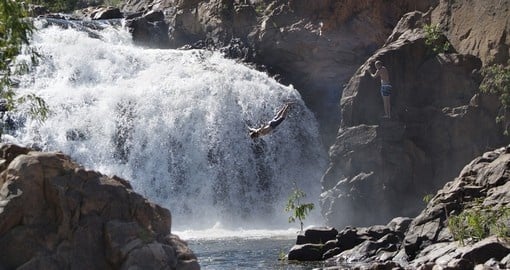 Take a leap off the Edith Falls into the water bellow during your Australia Vacations.