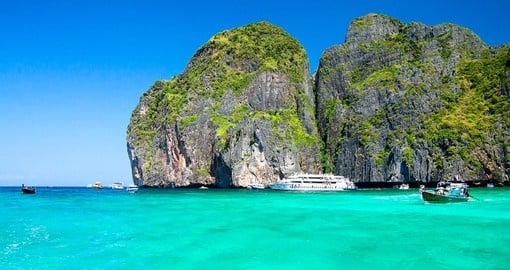 Swim in bright blue water on Phi Phi Island  during your Thailand Tour