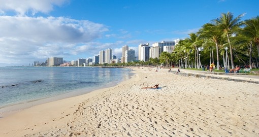 Visit Waikiki Beach in Honolulu during your Hawaii vacation.