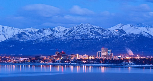 Anchorage skyline at night framed by an awesome mountain scene