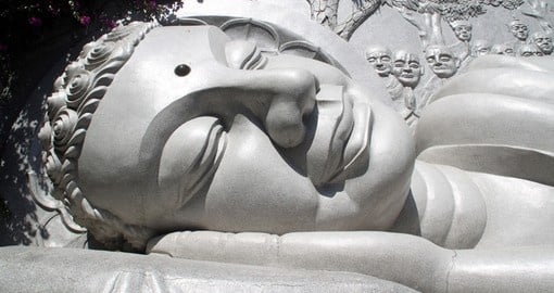 A sleeping white Buddha on a hill overlooking Nha Trang