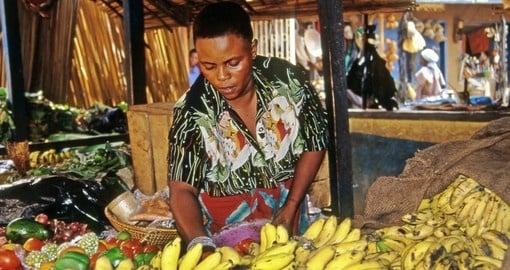 A vendor in the markets of Kampala