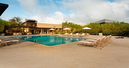 Lounge by the pool on your trip to the Galapagos