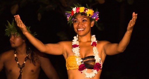 Watching traditional Dancers in Tahaa is a great inclusion to your Tahiti vacation.