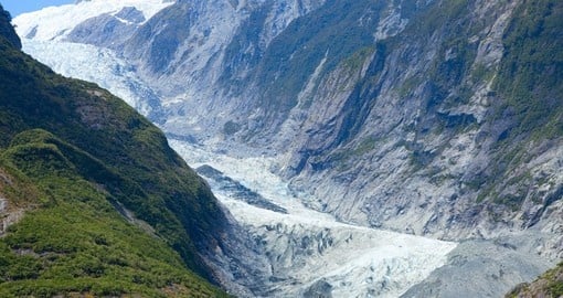 Trek up the mountainside on one of your New Zealand Tours and marvel in the presence of Franz Josef Glacier.