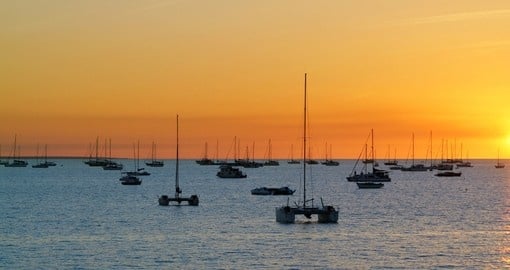 Enjoy a relaxing catamaran ride through Fannie Bay at sunset during your Australia Vacations.