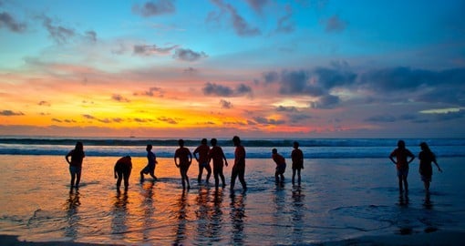 Enjoy fabulous sunsets at Kuta beach while on your Bali vacation. 