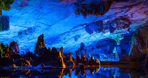 Take in the wonder of the Reed Flute Cave on your China Tour