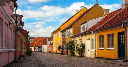 You will see the city of Odense during your Denmark trip.