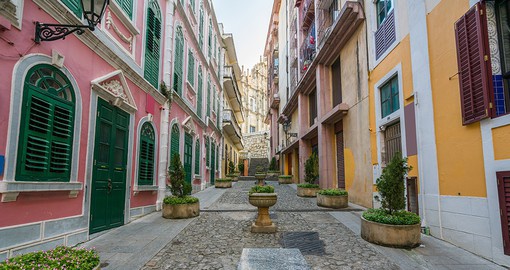 Admire the colourful streets of Macau as you wander and explore the area