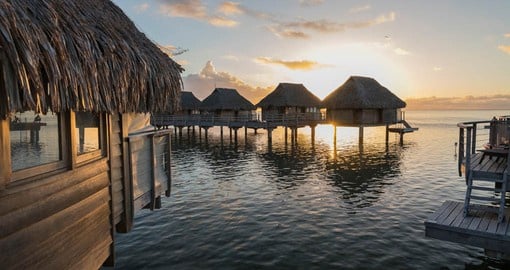 Enjoy the breathtaking sunset on the island of Moorea on your trip