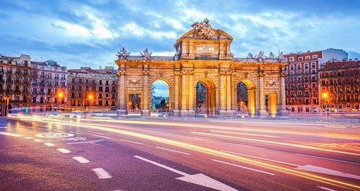 Step through the Puerta de Alcalá, one of the original five doors used by travellers to enter Madrid