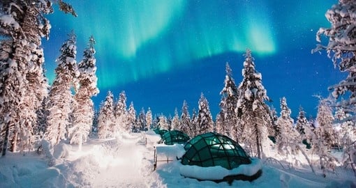 Watch out for the northern lights while visiting Kakslauttanen on your Finland Tour