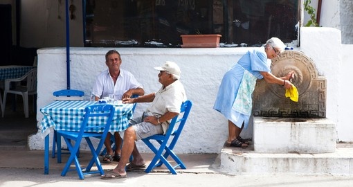 An evening at a traditional Greek Restaurant is sure to be a highlight of any Greece vacation package.