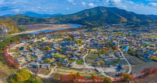 Dive into historical culture with a visit to Hahoe Folk Village, a historical village from the Joseon Dynasty