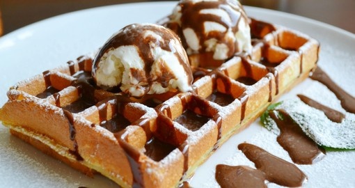 Belgian waffle with ice cream, chocolate and mint