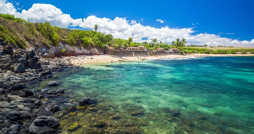 En route the Road to Hana, take a quick break to explore Ho'okipa Beach, known for its surfing, sunbathing, and sea turtles