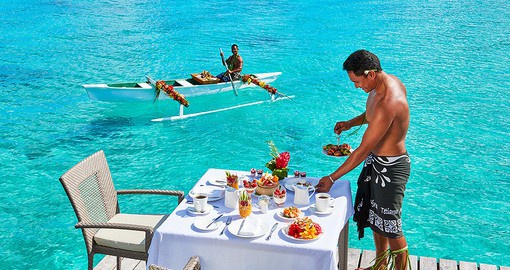 Experience a Tahitian breakfast delivered by canoe
