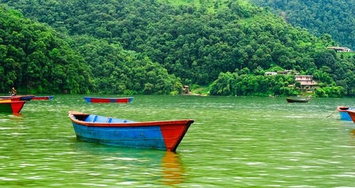 Float along Lake Pokahara which is surrounded on all sides by lush greenery on one of your Nepal Tours