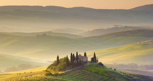 The beautiful rolling hills of Tuscany at dawn