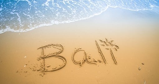 Why not write your name on a sandy tropical beach in Bali