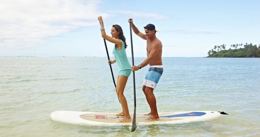 Experience Stand Up Paddle Boarding during your next Cook Island tours.