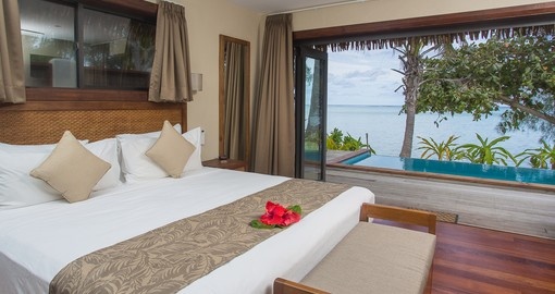 Stay in a beachfront villa at the Nautilus Resort during your Cook Islands trip