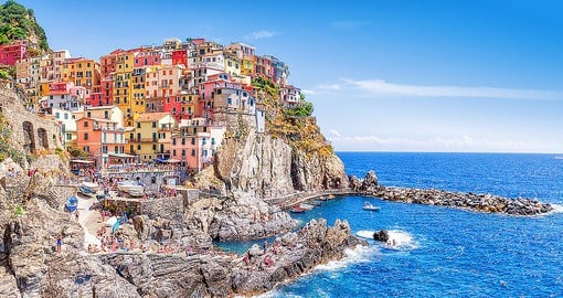 Drive through Cinque Terre and explore villages on the way on your next Italy vacations.