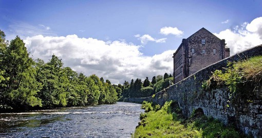 Visit the Deanston Distillery and learn about single malt whiskey on your trip to Scotland