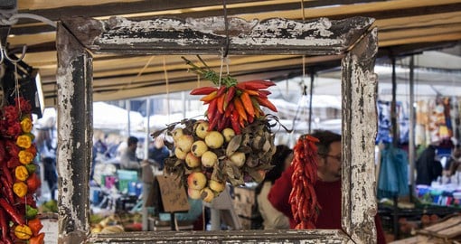 Rome has a variety of great neighborhood food markets offering locally-sourced vegetables, seafood, meat and cheese