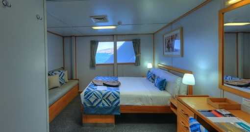 Rooms feature picture windows for expansive ocean views (except some Cabin category rooms featuring portholes), ample storage space and air-conditioning.