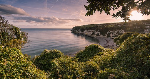 Go for a coastal stroll in Devon, known for their endless beaches